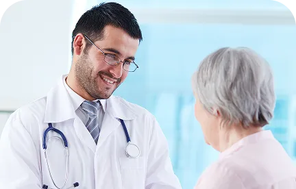 Doctor consulting with parent and child